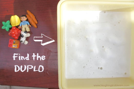 Find the lego pieces in soapy water