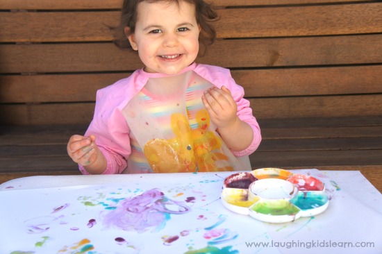 children laughing with edible paints