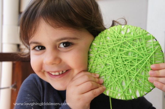 wool or yarn wrapped circle shapes for learning activity