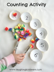 Counting activity for kids using pompoms