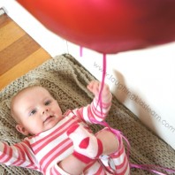Kicking balloon play for baby