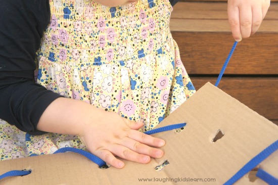 Simple lacing activity for kids using homemade board