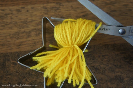 Making pompoms using a cookie cutter