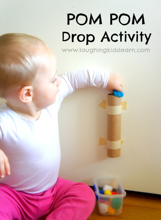 Pom pom drop activity for toddlers. Great for fine motor skills and developing cause and effect. So easy to set up so start collecting your cardboard paper tubes. 
