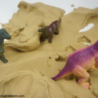 dinosaurs in playdough is great for sensory play bins and uses only 3 ingredients.