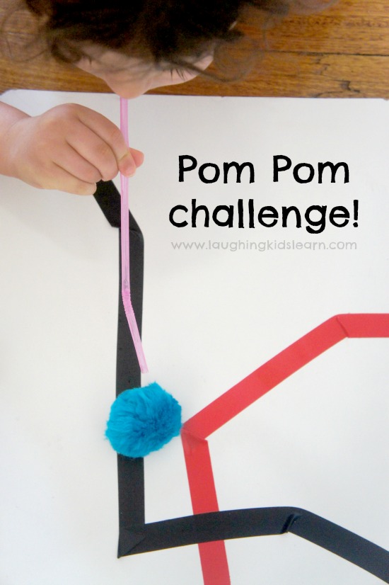 Pom pom challenge using a straw and tape