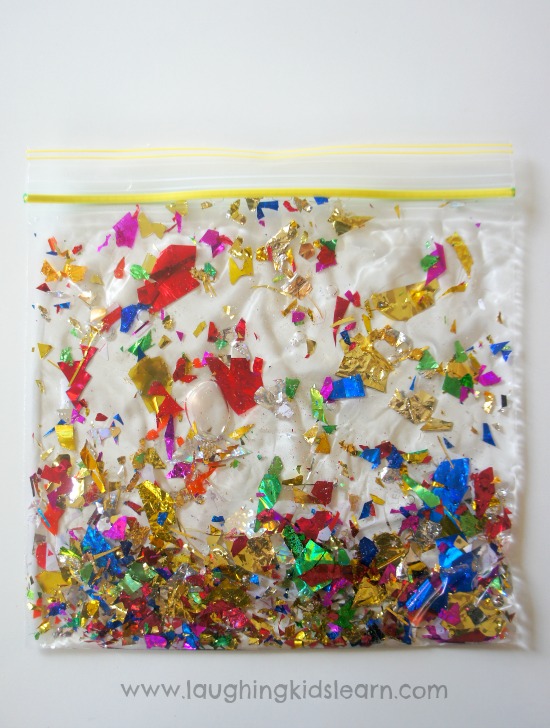 simple sensory bag for kids using baby oil and glitter