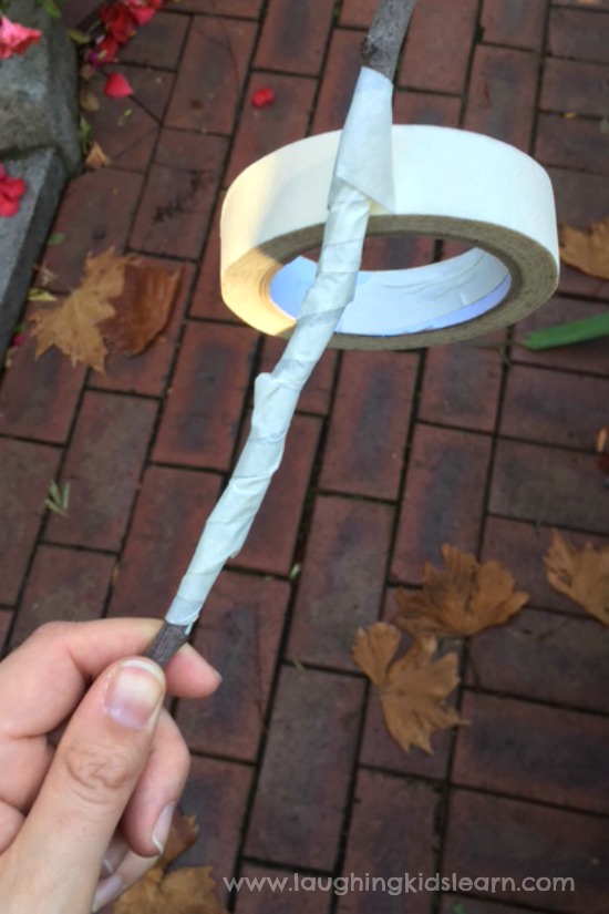 Masking tape on a nature wand stick