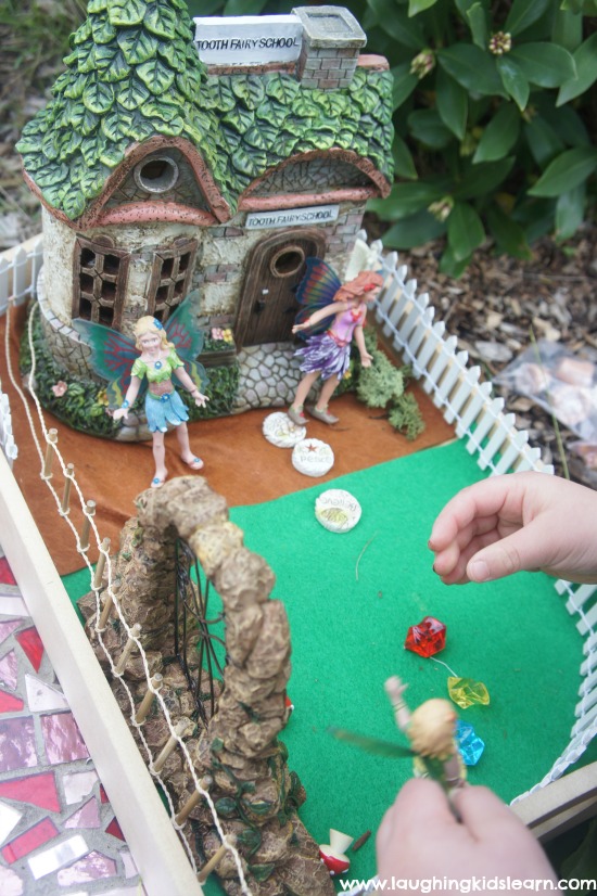 playing with fairy garden outdoors
