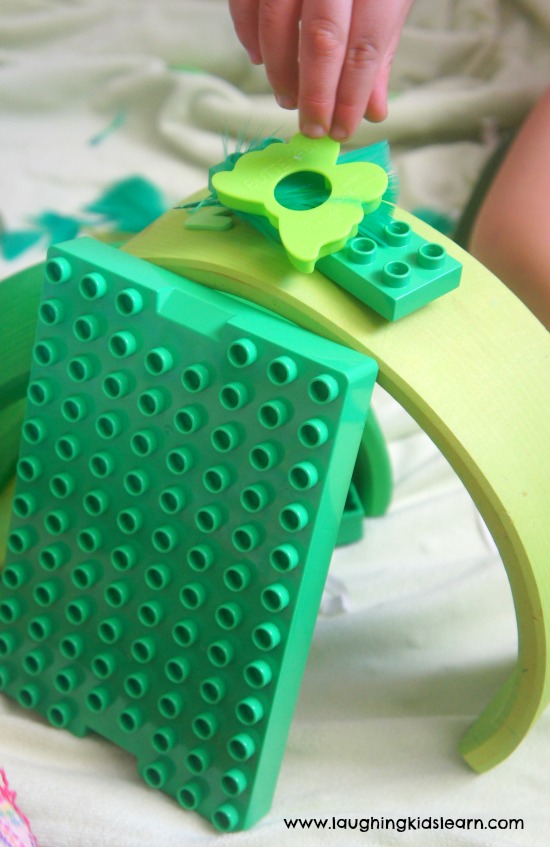 building construction with green objects