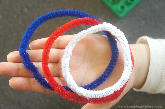 Pipe cleaner rings for LEGO Duplo ring toss game for kids