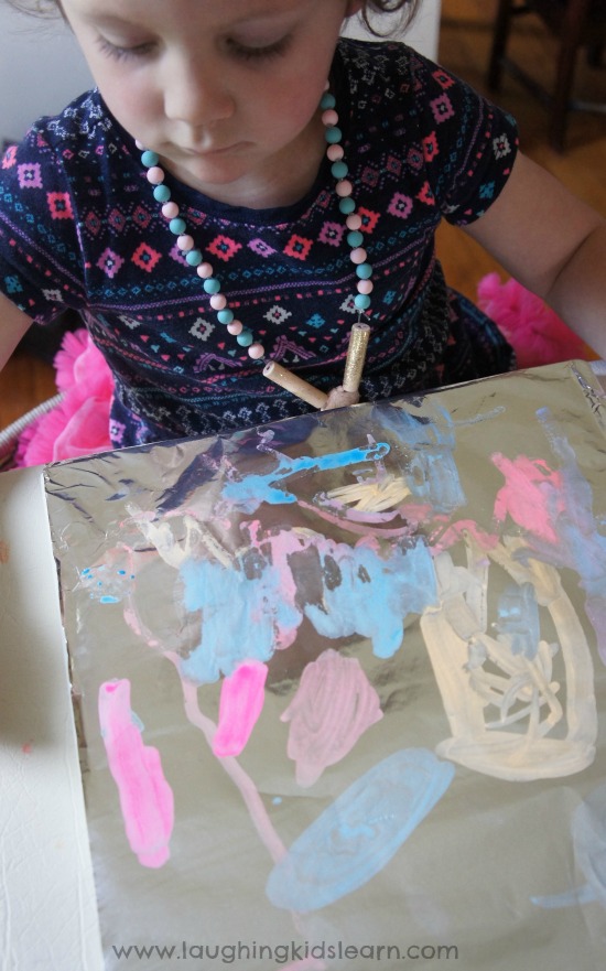 toddler activity painting on tin foil