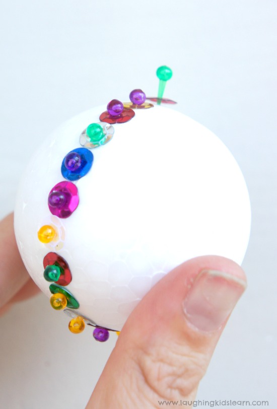 pinned sequins on christmas bauble