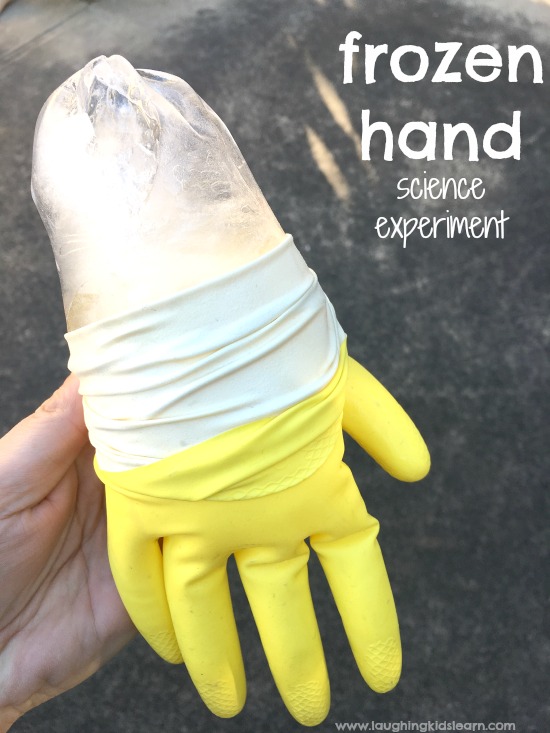 Frozen hands science experiemtn. Fun science activities and experiment for kids to do at home or school. Learn how water turns to ice. 
#frozen #scienceexperiment #scienceforkids #winterplay #summeractivities #homeschool #watertoice #frozenhands #activitiesforkids #preschool #prek #school #funforkids #playmatters #learningwithplay