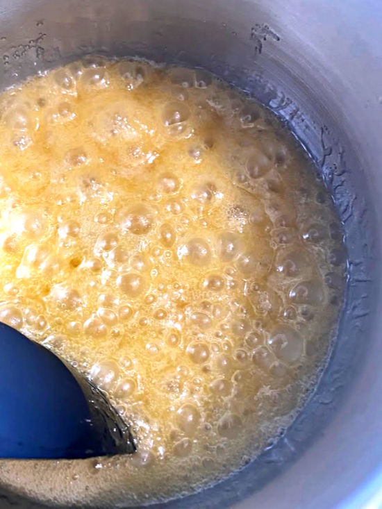 mixing liquid ingredients together to make honey joys. 