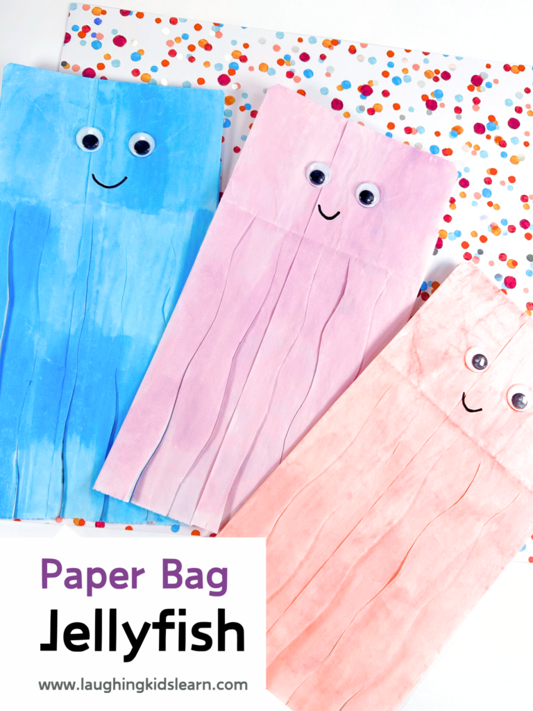 Preschooler creating a vibrant paper bag jellyfish with googly eyes, ideal for ocean-themed crafting