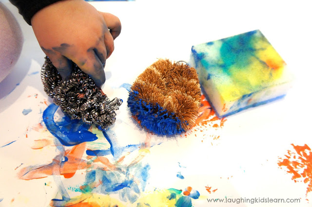 Printing and painting with kitchen cleaners. Great sensory activity for children. 